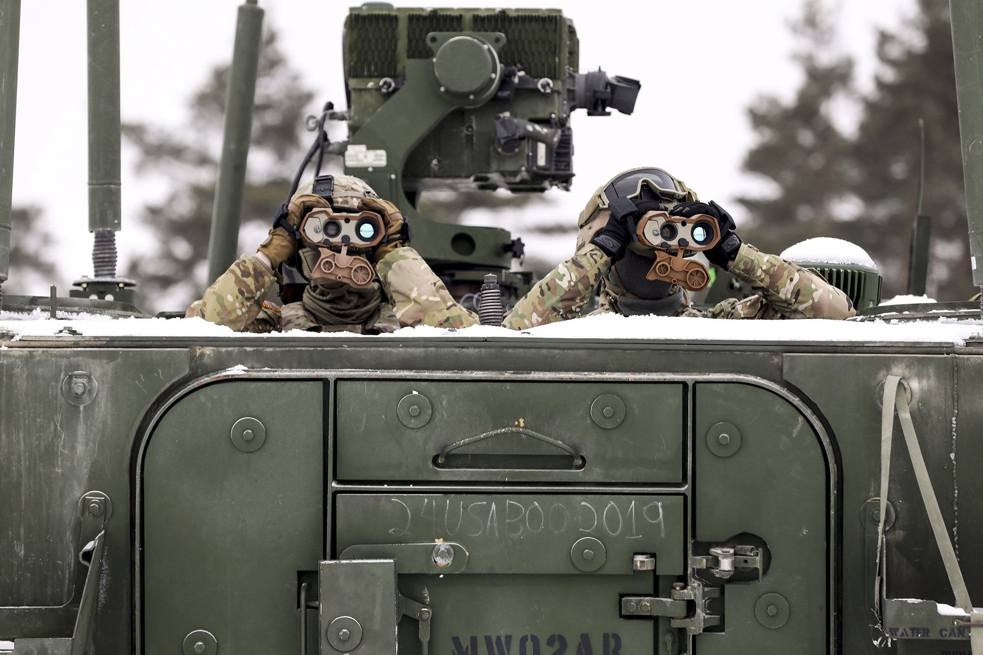 Soldiers from 1st Squadron, 2d Cavalry Regiment, enhanced Forward Presence Battle Group Poland, keep watch on targets during a joint combat live fire of the Gepard Air Defense System Feb. 2, 2021, at Bemowo Piskie Training Area, Poland.