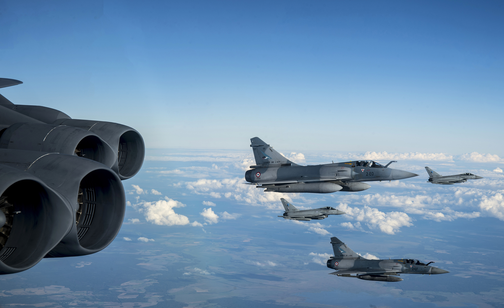 Two French Dassault Mirage and two Italian Typhoon fighter jets integrate with a U.S. B-52H Stratofortress in support of the Bomber Task Force Europe mission, Allied Sky, on Aug. 28, 2020.