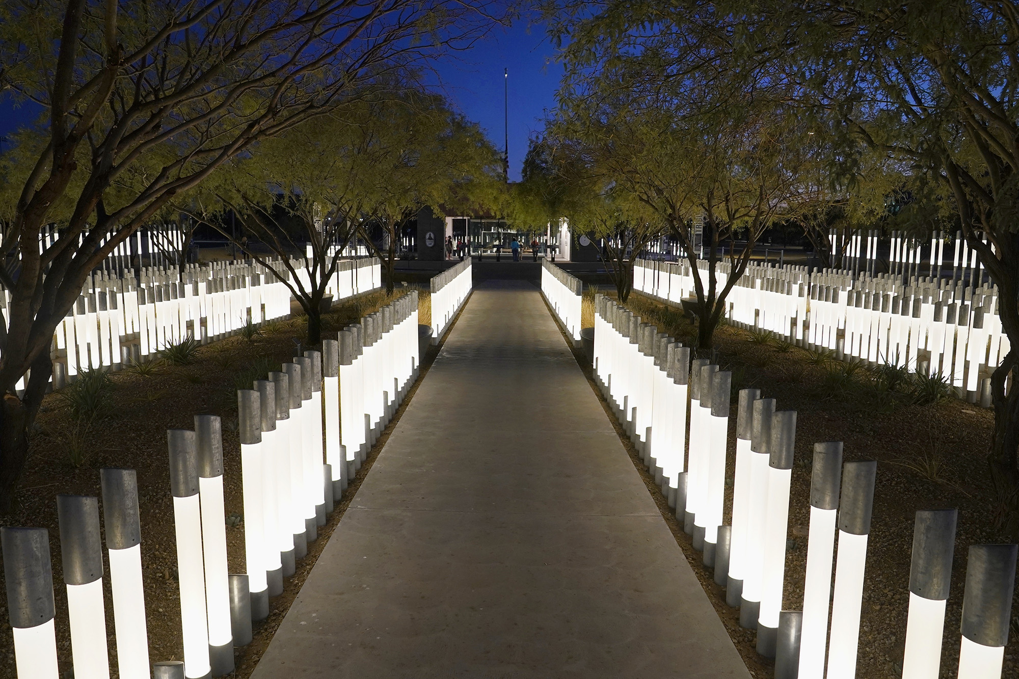 Some of the 1,500 columns, many illuminated, highlight the Salt River Pima-Maricopa Indian Community memorial tribute on Nov. 11, 2020, Veterans Day, in Scottsdale, Ariz.