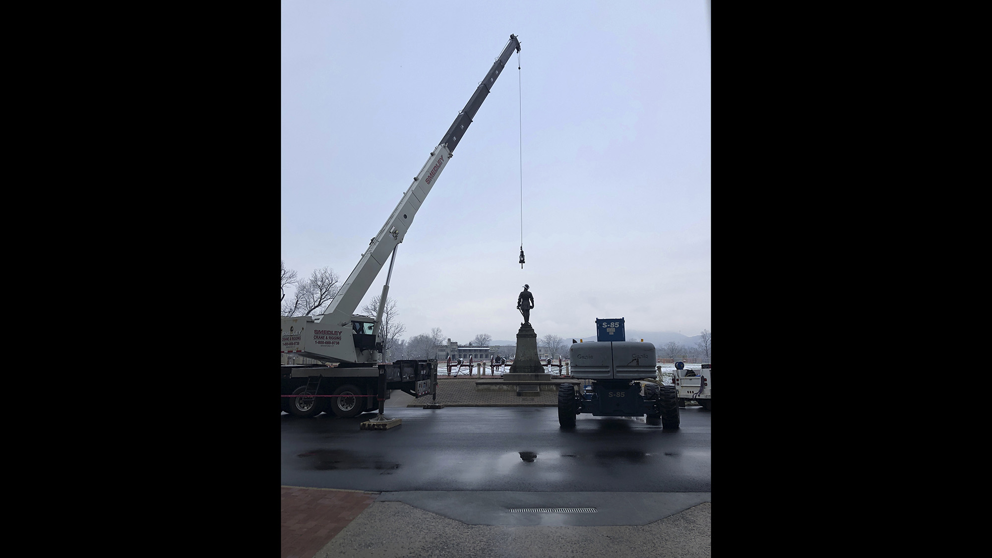 Crews prepare to remove a statue of Confederate Gen. Thomas "Stonewall" Jackson from the campus of the Virginia Military Institute on Monday, Dec. 7, 2020, in Lexington, Va.