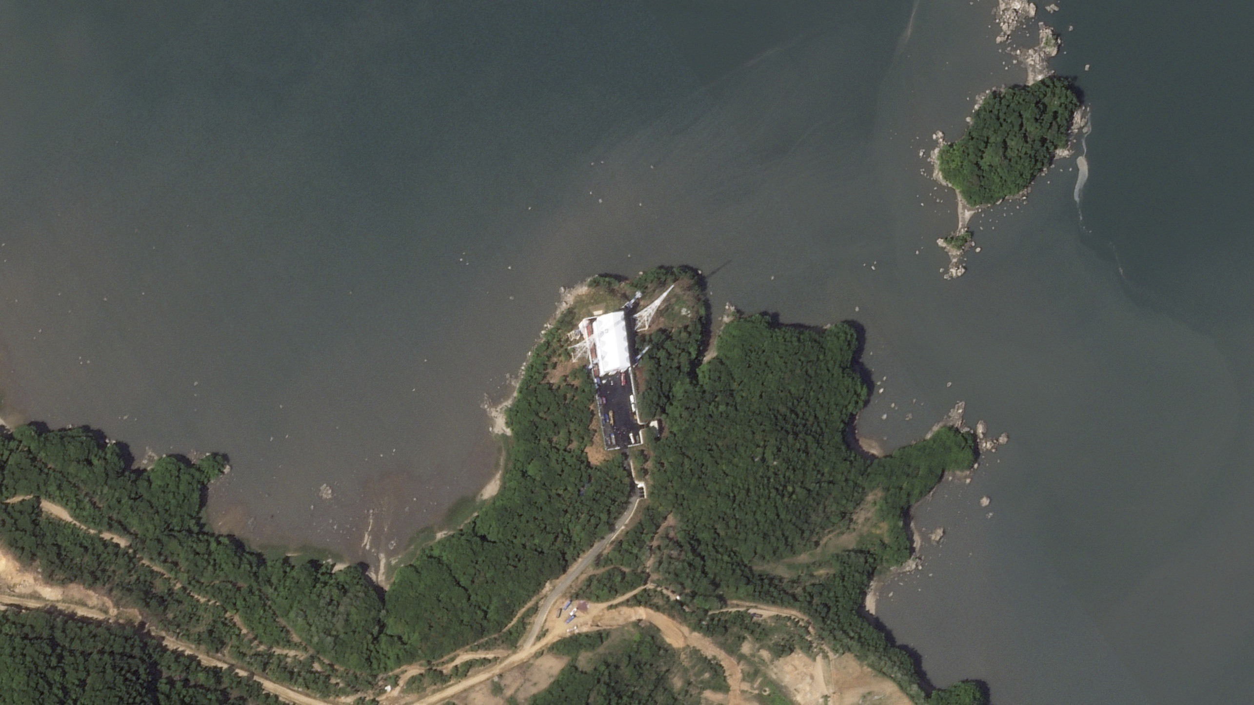 This satellite picture by Planet Labs PBC shows activity at a newly built launch pad at the Sohae Satellite Launching Station near Tongchang-ri, North Korea, Tuesday, May 30, 2023.